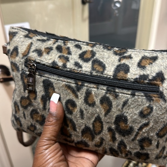 A Vegan animal print clutch with a shoulder strap - Picture 10 of 11